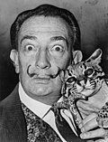 Salvador Dalí with his pet ocelot Babou