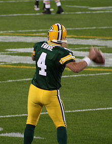 Favre throwing a football during a game
