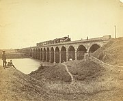 Photograph (1858) of the Dapoorie viaduct over the Mula River near Poona in Bombay Presidency.[100]