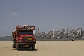 Decorated truck at a beach in Mumbai.