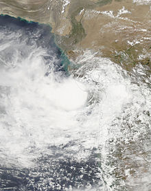 A satellite image of Deep Depression ARB 02 located just off the Gujarati coast shortly before landfall on 23 June