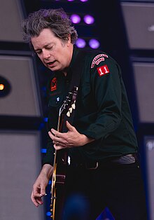 White performing with Green Day in 2024