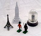 Examples of souvenirs: figurines, models, snow globe