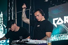 Corey James (right) performing at Beats for Love (2019)