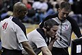 Image 6NBA officials Monty McCutchen (center), Tom Washington (#49) and Brent Barnaky reviewing a play. (from Official (basketball))