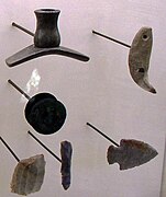 Hopewell pipe, points, and earspool on display at Serpent Mound