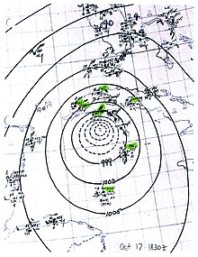 A map showing the cyclone's isobars with nearby weather station observations plotted.