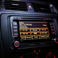 An example of the evolution: 2010's Volkswagen has a smart panel both with buttons and a touch screen to play radio.