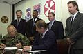 Image 39National Federation of Federal Employees officials sign a collective bargaining agreement with the U.S. 8th Army in October 2002.