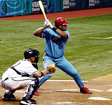 Albert Pujols, wearing the Cardinals' alternate powder-blue uniform, prepares to swing