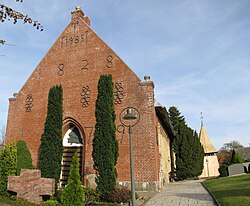 The church in Bargum, note the separate wooden bell tower, a typical architectureal feature in North Frisia and also in Angeln ("Anglia")