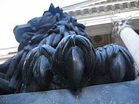 Detail of one of the two bronze lions outside the Congress of Deputies of Spain building