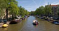 Image 8 Amsterdam Photo credit: Diliff A stitched panorama of a canal in the city of Amsterdam, the capital of the Netherlands. A series of concentric, semi-circular canals ("grachten") were dug around the old city centre in the 17th century, along which houses and warehouses were built. The canals still define Amsterdam's layout and appearance today. More selected pictures