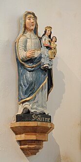 Statue of Saint Anne. She holds the Virgin Mary and baby Jesus