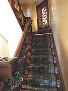 Staircase leading to the second floor.