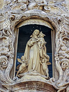 Virgin of the Rosary above of the entrance