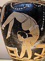 A female acrobat next to a potter's turntable. Detail from a Campanian red-figure hydria, ca. 340-330 BC.