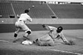 Image 24 Ty Cobb Photo: National Photo Company; restoration: Lise Broer; crop: jjron Ty Cobb (1886–1961), shown here sliding into third base on August 16, 1924, was an American Major League Baseball (MLB) outfielder. He spent twenty-two seasons with the Detroit Tigers, including six as the team's player-manager, and finished his career with the Philadelphia Athletics. During this time Cobb set ninety MLB records, though his abilities were sometimes overshadowed by his surly temperament and aggressive playing style. In 1936 Cobb was made an inaugural member of the Baseball Hall of Fame, and in 1999 editors at the Sporting News ranked him third on their list of "Baseball's 100 Greatest Players". More selected pictures