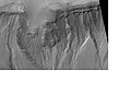 Gullies on mound in Asimov Crater. Location is Noachis quadrangle.