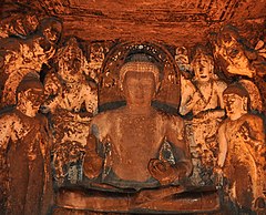 Buddha in a preaching pose flanked by bodhisattvas in Cave 4, Ajanta