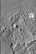 Box outlines area in next image from HiRISE. Knobs and mesas were probably formed from the erosion of deposits in an old crater.