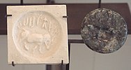 Indus round seal with impression. Elongated buffalo with Harappan script imported to Susa in 2340–2200 BC. Found in the tell of the Susa acropolis. Louvre Museum, reference Sb 5614[63]