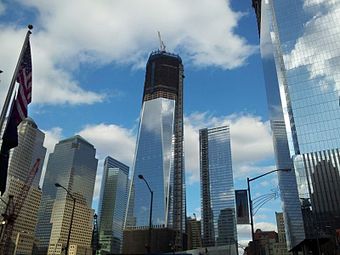 Progress as of December 23, 2011, pictured from the corner of Liberty and Greenwich Street. Steel is up to 92 floors, glass is up to 68 floors, and concrete is up to 84 floors.