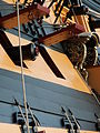 The muzzle of a 24-pounder cannon on the preserved ship of the line, HMS Victory. The red tampion is secured with a cord