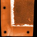Non-destructive testing: Paper core composite sample.