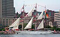 With the crew in the yardarms, Taragini slips along the Halifax, Nova Scotia, Canada waterfront in 2007.