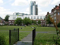 Tabard Gardens has a large grassed area and is surrounded by houses and flats