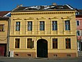 Neoclassical building with eyes (Sibiu)