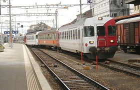 Modernized ABt 371 and RBDe 567 171 with B 362 in old livery in Neuchâtel on 29 March 2006
