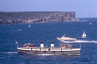 As a Brambles Limited ferry, passing hydrofoil Dee Why. Her namesake, North Head, is in the background.