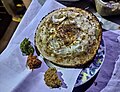 Egg Chitoi Pitha served with different spices in Bangladesh