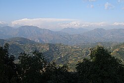 Mahabharat Range near Tansen. The High Himalayas are barely visible in the snow and cloud.