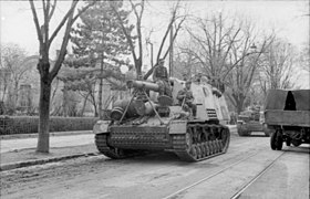 A Hummel passes through a town in Romania, March 1944