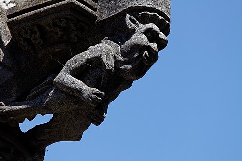 A demon under the bad robber waits to whisk his soul to hell. Part of the Lampaul-Guimiliau calvary
