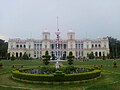 A view of Cheluvambavilas Palace on a winter morning fog
