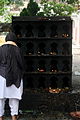 Numerous small cubicles are used for burning of oil lamps