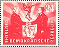 Image 91951 East German stamp commemorating the Treaty of Zgorzelec establishing the Oder-Neisse line as a "border of peace", featuring the presidents Wilhelm Pieck (GDR) and Bolesław Bierut (Poland) (from History of East Germany)