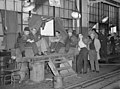 Image 12Union members occupying a General Motors body factory during the Flint Sit-Down Strike of 1937 which spurred the organization of militant CIO unions in auto industry (from History of Michigan)