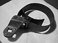 A strap wrench variant (one form of oil filter wrench).