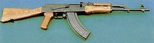 AKM with lighter stamped-steel receiver and muzzle-brake