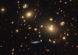 Gravitational lensing system SDSS J0928+2031.[8]