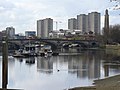 View from Chiswick, from right to left; Brentford Museum of Water and Steam pumping tower, Kew Bridge (Centre), River Thames, Brentford Towers, GSK building