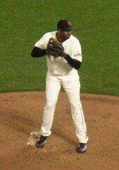 A man standing on a pitching mound wearing a San Francisco Giants' uniform