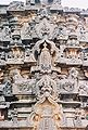 Kirtimukha (demon face) with miniature tower decorative arch combination going up the shrine superstructure