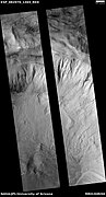 Wide view of gullies in a crater, as seen by HiRISE under HiWish program The black strip is where data were not gathered. This image was named HiRISE Picture of the Day for June 25, 2024.