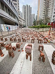 Protester-placed bricks on a road